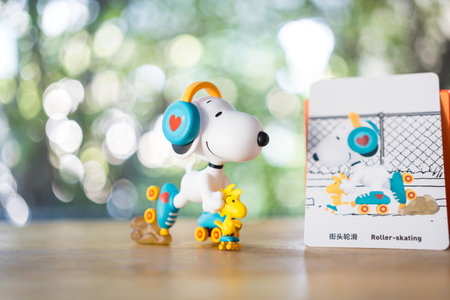 BANGKOK, THAILAND - FEBRUARY 16, 2024 : A toy of Snoopy, Roller skating, cute toy from pop mart the Best Friends series figures, a size height about 10cm.のeditorial素材