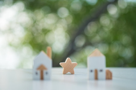 Wood star shape on the center blur of wood home. Real estate rating assessment. Property valuationの写真素材