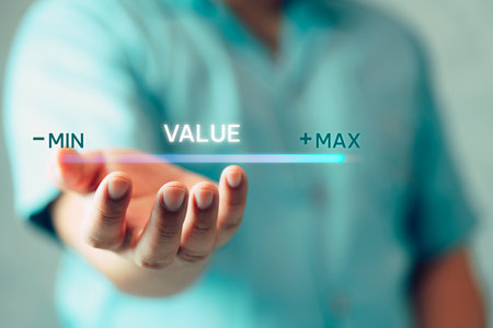 A technician man holding virtual progress bar for increasing value added to business product and service concept. Development to success, profit and growing growth plan. Go to positive things.の写真素材