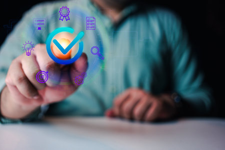 Businessmen touch a quality assurance virtual graphic with an icon. Concept of certifications and quality control and standards guarantee. The best quality assurance for product warranty and service conceptの写真素材