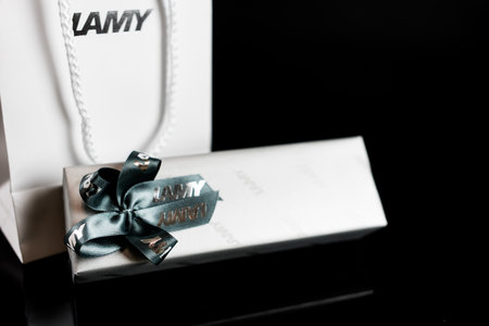 Bangkok, Thailand - March 18, 2024 : A gift wrapping box of the GERMAN branded LAMY on a black background.のeditorial素材