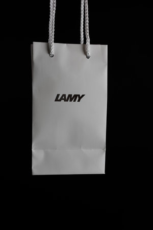 Bangkok, Thailand - March 18, 2024 : A white paper bag with silver Lamy icon logo. Lamy pen Germany Brandのeditorial素材
