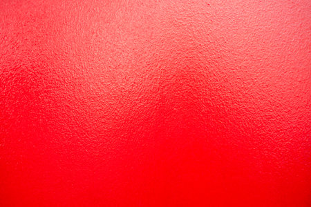 The walls are made of red cement plaster. For texture background images, abstract red cement wall texture and backgroundの写真素材