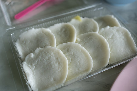 Cupcake Kanom Tuay is Thai coconut pudding with a creamy coconut cream a top. Its name derived from the small ceramic cups in which the dessert is cooked and served.の写真素材