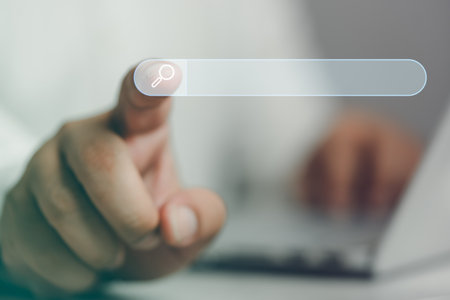 Search Engine Optimisation for SEO concept, Man touch search bar for using input keyword and search and find information.の写真素材