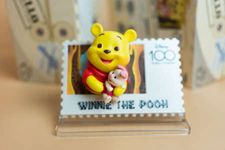 Bangkok, Thailand - May 21, 2024 : Figure of Winnie the pooh. MINISO Disney 100 Years of Wonder Retro Stamp Series, Blind Box Figureのeditorial素材