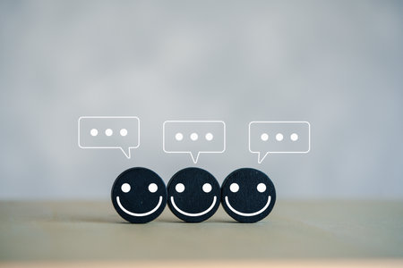 Three happy face icon on black wooden circle label. World mental Health day. Human development, Psychology personality concept.の写真素材