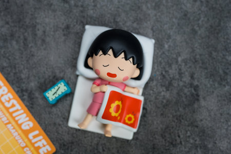 Bangkok, Thailand - June 13, 2024 : Toy a Overslept Maruko form POP MART Chibi Maruko-chan's Interesting Life Series Blind Box.のeditorial素材