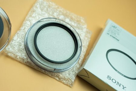 Bangkok, Thailand - June 13, 2024 : MC Protecting Filter. High quality optical glass from Sony for DSLR camera. Filter protects the camera lens from dust, dirt, and fingerprints.のeditorial素材