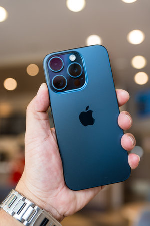 BANGKOK, THAILAND - JUNE 16, 2024 : iPhone 15 Pro Titanium blue color with a rare triple camera, incorporated using tetraprisms technology by Appleのeditorial素材