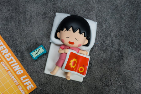 Bangkok, Thailand - June 16, 2024 : Toy a Overslept Maruko form POP MART Chibi Maruko-chan's Interesting Life Series Blind Box.のeditorial素材