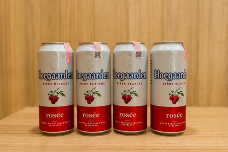 BANGKOK, THAILAND - JUNE 16, 2024 : A row can of Hoegaarden Rosee, a well-known wheat beer from Belgiumのeditorial素材
