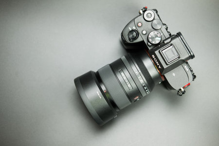 Bangkok, Thailand - June 16, 2024 : Sony Alpha a7 IV full frame hybrid MILC mirrorless camera with GM lean FE 35mm F1.4. The best mirrorless cameraのeditorial素材