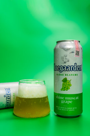 Samut Prakan, Thailand - May 26, 2024 : Can and glass of Belgian Hoegaarden Shine Muscat Grape, new flavor in Thailand.のeditorial素材