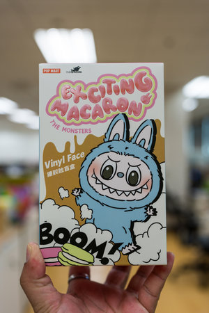 Bangkok, Thailand - June 23, 2024 : POP MART Labubu Exciting Macaron Blinded Box in hand