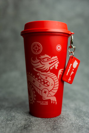 Bangkok, Thailand - June 24, 2024 : A red reusable cup from Cafe Amazon, Get power to enhance your luck with cup name of Dragon pattern. Get 1 free Dragon Reusable Cup in June 24, 2024のeditorial素材
