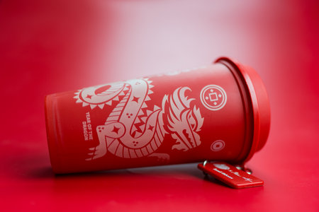 Bangkok, Thailand - June 24, 2024 : A red reusable cup from Cafe Amazon, Get power to enhance your luck with cup name of Dragon pattern. Get 1 free Dragon Reusable Cup in June 24, 2024のeditorial素材