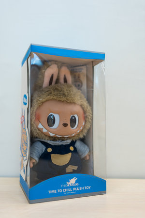 Bangkok, Thailand - June 25, 2024 : A cute doll of LABUBU Time to Chill-Vinyl Plush Doll. POP MARTのeditorial素材