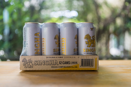 Bangkok, Thailand - June 24, 2024 : A packs 12 Singha beer long can 490ml. Singha beer cans which is one of the most famous Thai beer brands. Preparing for the party.のeditorial素材