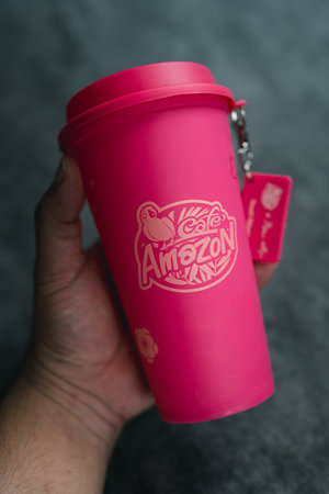Bangkok, Thailand - June 26, 2024 : A pink reusable cup from Cafe Amazon, Get power to enhance your luck with cup name of Dragon pattern. Get 1 free Dragon Reusable Cup in June 25, 2024のeditorial素材