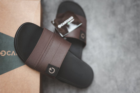 Bangkok, Thailand - June 26, 2024 : Cartago man slide sandals, the foot pad foot comfort. Close upのeditorial素材
