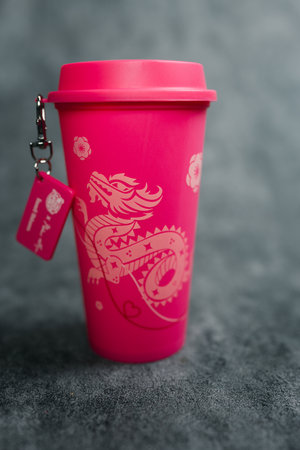 Bangkok, Thailand - June 26, 2024 : A pink reusable cup from Cafe Amazon, Get power to enhance your luck with cup name of Dragon pattern. Get 1 free Dragon Reusable Cup in June 25, 2024のeditorial素材