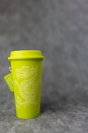 Bangkok, Thailand - June 28, 2024 : Dragon reusable cup from Cafe Amazon, Get power to enhance your luck with cup name of Dragon pattern. Get 1 free one cup when order via online deliveryのeditorial素材
