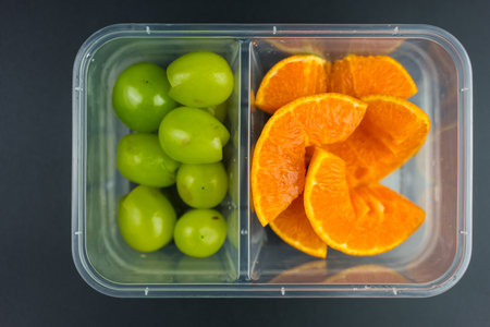Healthy eating concepts. Fruit healthy food delivery. Take away of fitness meals. Top viewの写真素材