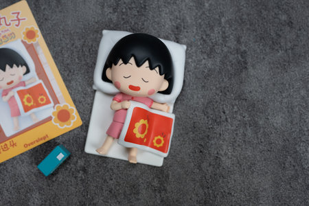 Bangkok, Thailand - June 9, 2024 : Toy a Overslept Maruko form POP MART Chibi Maruko-chan's Interesting Life Series Blind Box.のeditorial素材
