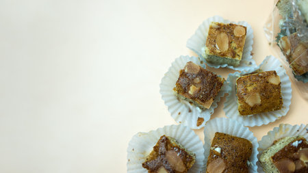 Close up square cut of sweet and soft banana cake. Delicious and healthy bakery. top view have copy spaceの写真素材