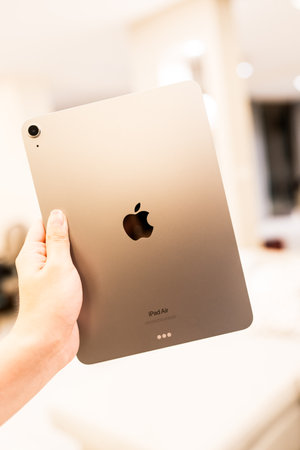 Bangkok, Thailand - July 17, 2024 : A man hand holding iPad Air 11 inch, M2 Space grayのeditorial素材