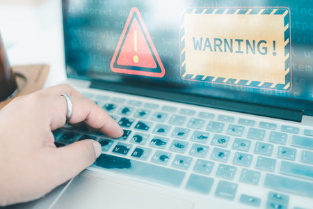 System warning hacked alert, Protection against personal data hacking, Notification error mark computer virus detected caution, Cyber attack on computer network, Virus and cybercrime, Cybersecurity.の写真素材