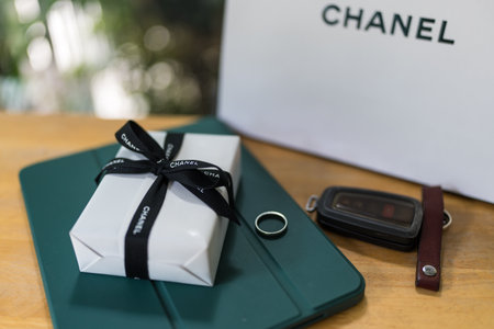 Bangkok, Thailand - August 3, 2024 : Luxury Chanel gift with proper packaging showing the brand on the ribbon. Perfect for surprise father or husband.のeditorial素材