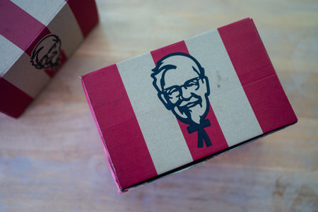 BANGKOK, THAILAND - AUGUST 17, 2024 : Food delivery box for KFC fast food restaurant. Kentucky Fried Chickenのeditorial素材
