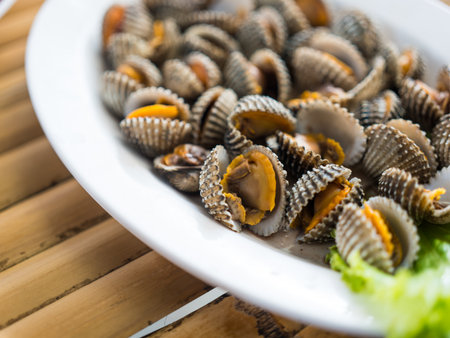 Delicious boiled or steamed cockles. Fresh seafood in Thailand.