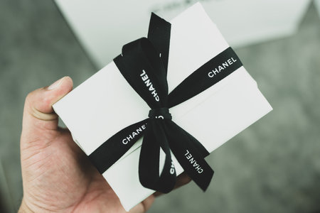Bangkok, Thailand - August 28, 2024 : Chanel gift with proper packaging showing the brand on the ribbon. Perfect for Valentine day or Christmas.のeditorial素材