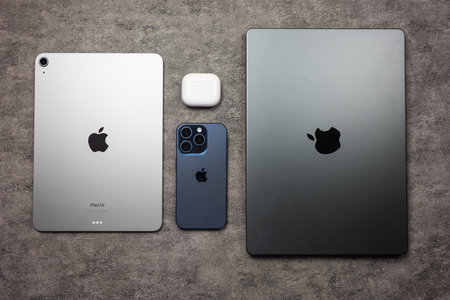 Bangkok, Thailand - September 2, 2024 : Apple devices include Macbook Pro M4, iPad air M3 Max, iPhone 15 Pro and Airpods 3rd created by Apple Inc.のeditorial素材
