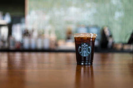 Bangkok, Thailand - September 8, 2024 : A ice Amarciano coffee Starbucks coffee in starbucks coffee shop. Starbucks is the world's largest coffee house with over 20,000 stores in 61 countries.のeditorial素材