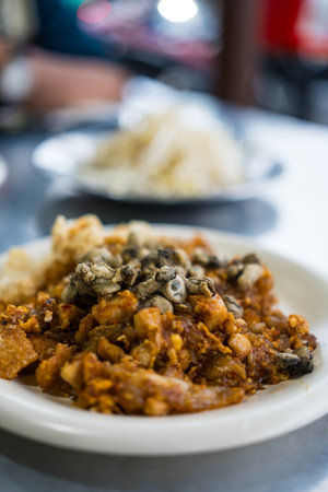Phuket traditional food called O-tao, O Tao is a unique stir-fried dish made with Yam Oyster...
