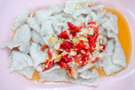 Thai spicy lime salad with pork Sprinkle with chili and garlic. Thai food.の写真素材