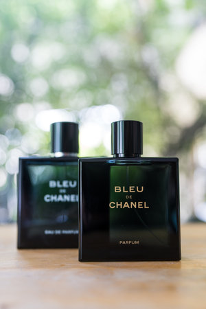 Bangkok, Thailand - September 21, 2024 : Bottle of Bleu De Chanel, PARFUM POUR HOMME on wood tableのeditorial素材