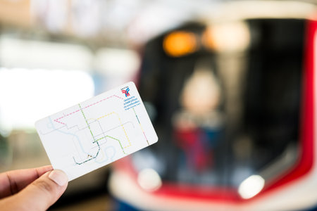 Bangkok, Thailand - September 21, 2024 : Hand shows a BTS Ticket. BTS Skytrain or The Bangkok Mass Transit System running in Bangkok. BTS Route has been designed to help people discover Bangkok.のeditorial素材