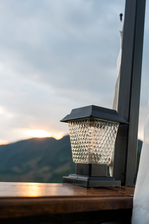 Black classic lamp with a mountain view. Beautiful viewの写真素材