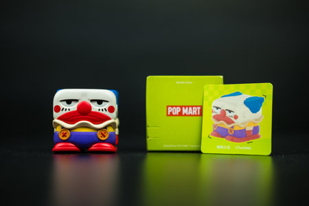 Bangkok, Thailand - October 4, 2024 : Chuckles toy, Disney, Pixar POP CUBE 1 Series figures from pop mart on a black backgroundのeditorial素材