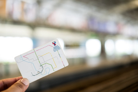 Bangkok, Thailand - October 4, 2024 : Commuters holding card for the system for Bangkok BTS Sky Train. Inside stationのeditorial素材