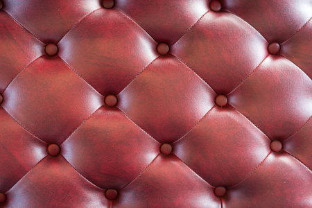 Leather upholstery dark red,  leather and texture backgroundの写真素材
