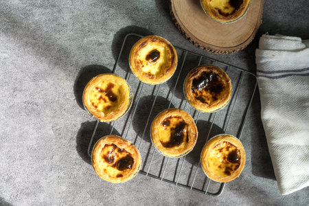 Freshly cooked egg tart, traditional portuguese dessert, pastel de nata, custard tarts