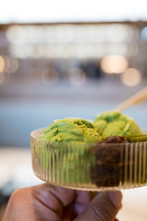 A bowl of green tea or matcha ice cream with sweet red beanの写真素材