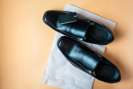 New black dress shoes with black tagの写真素材