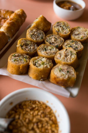 Plate of Vietnamese food. Delicious fried spring rollsの写真素材